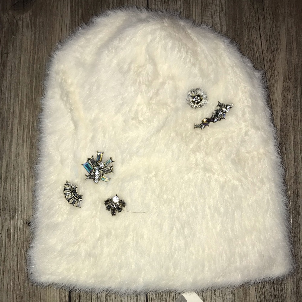 Sleeping on snow from Anthropologie NWT plush hat